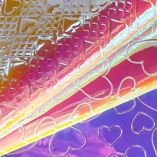 Patrón de corazón de alta calidad en forma de corazón PU cuero sólido cuero en relieve de cuero en relieve para bolsos muebles